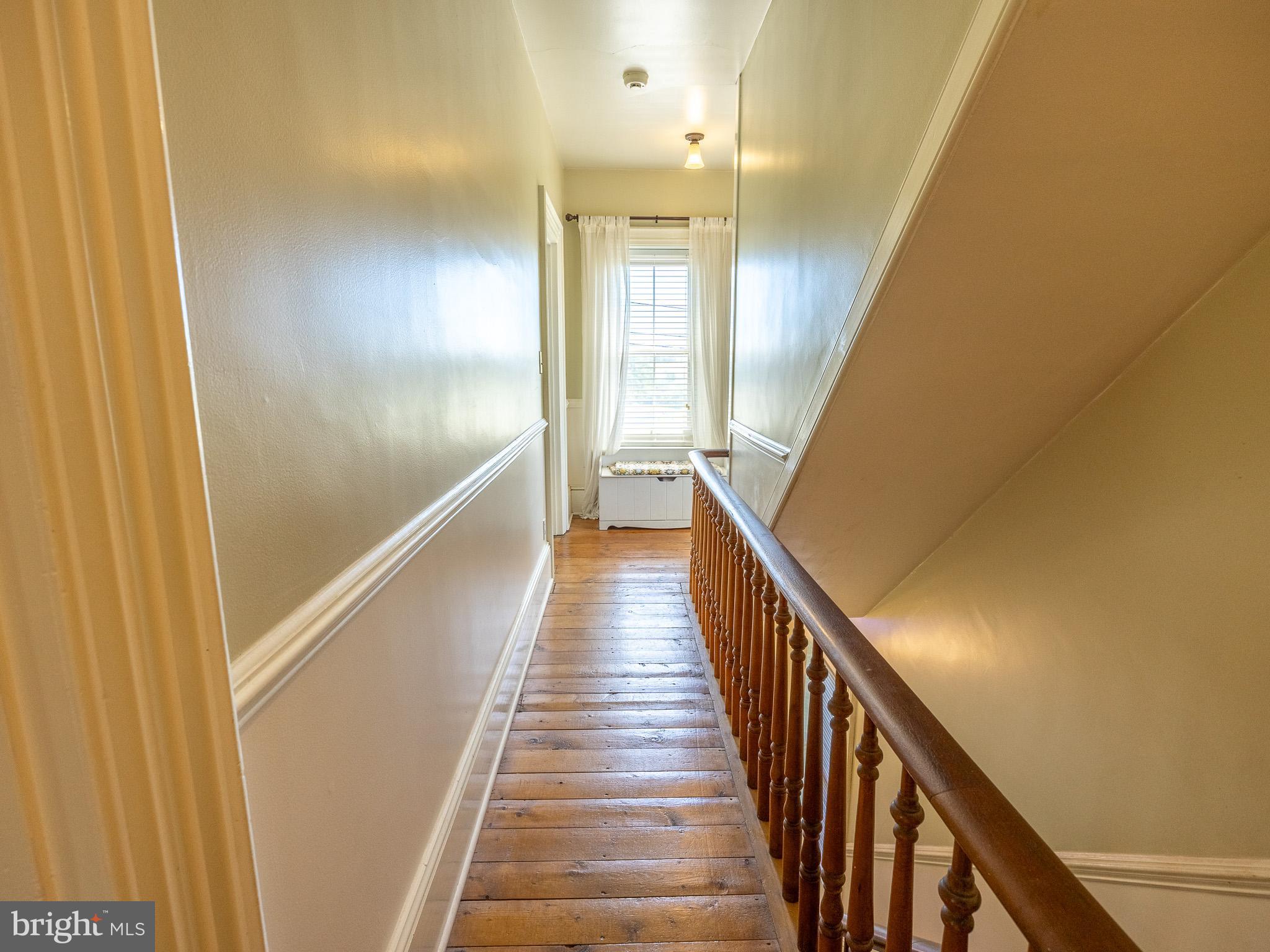 225 Niantic Road Barto, PA 19504 - Photo 48 of 82 a view of a hallway with wooden floor and staircase