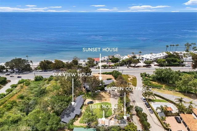 a view of a house with a big yard