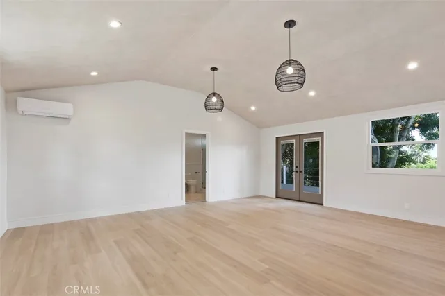 a view of a house with a tree