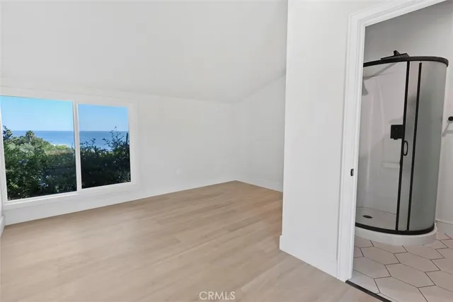 a kitchen with stainless steel appliances granite countertop a sink and a stove