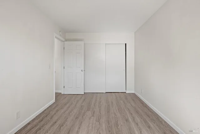 a kitchen with stainless steel appliances granite countertop a refrigerator sink stove and microwave