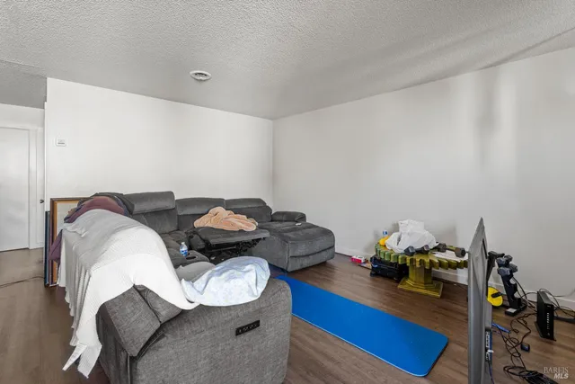 a brick building with a tree in front of it