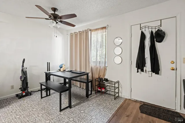 a kitchen with stainless steel appliances granite countertop a sink a stove and cabinets