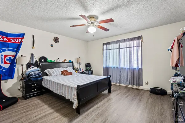 a view of a backyard with sitting area