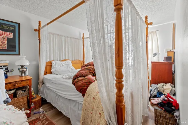 a view of a dining room with furniture and window