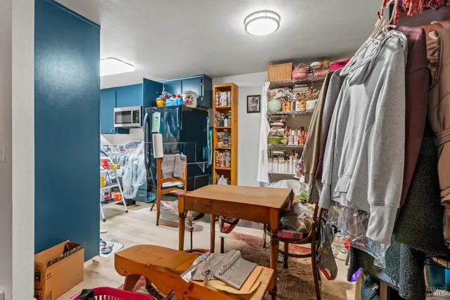 a brick building with a tree in front of it
