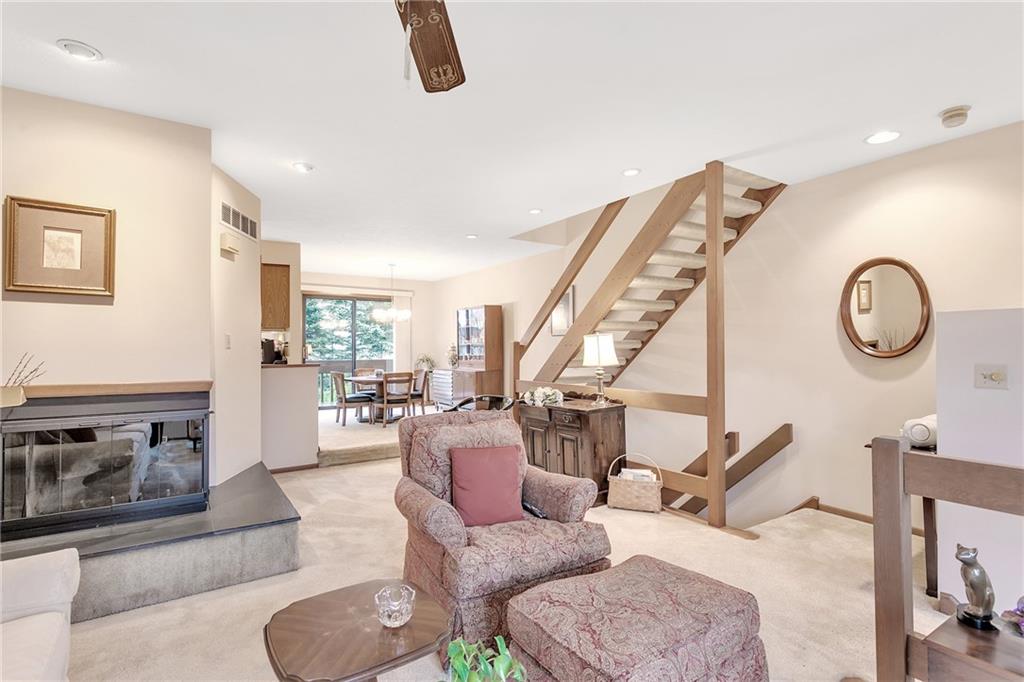 108 Spring Run Drive Monroeville, PA 15146 - Photo 8 of 25 This view acknowledges the open floor plan. The fireplace is currently gas logs but can be converted back to a log burning fireplace if you desire to do so. Note the desending and ascending stairs