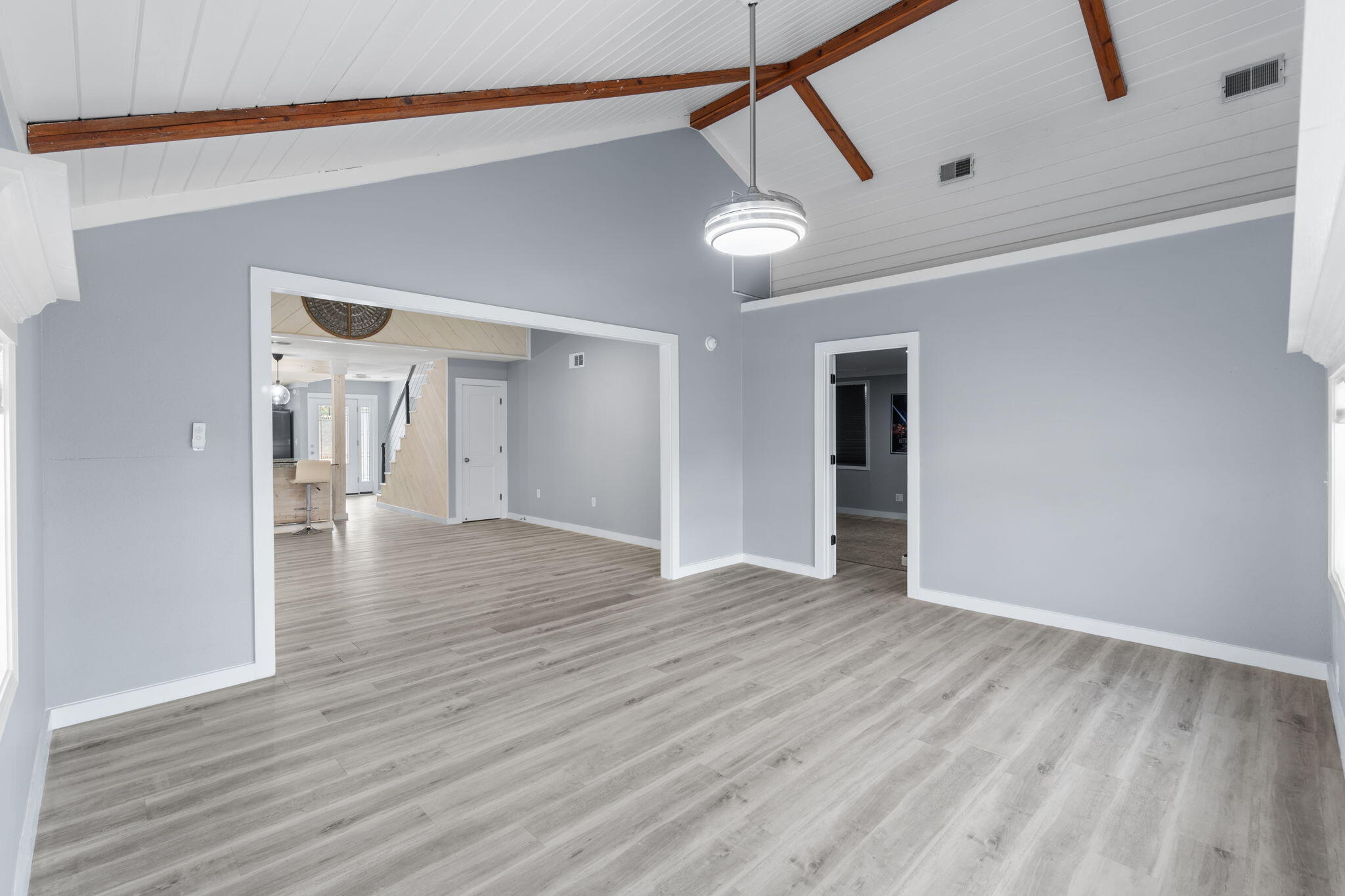 41 Solar Street Mary Esther, FL 32569 - Photo 19 of 40 a view of an empty room with wooden floor and a window