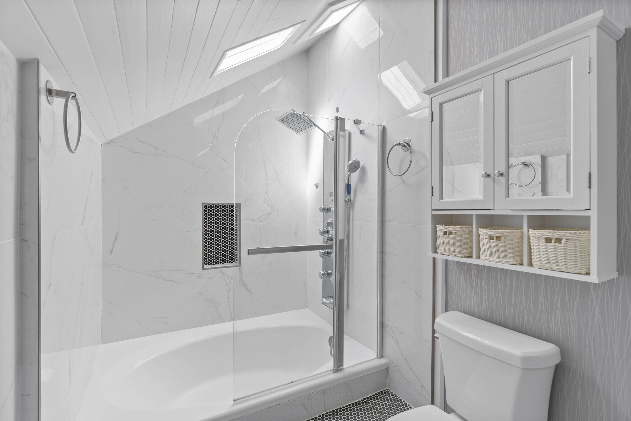 41 Solar Street Mary Esther, FL 32569 - Photo 31 of 40 a bathroom with a shower a toilet and a sink