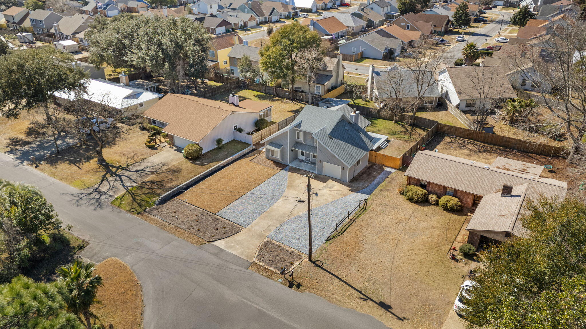 41 Solar Street Mary Esther, FL 32569 - Photo 38 of 40 an aerial view of multiple houses with yard