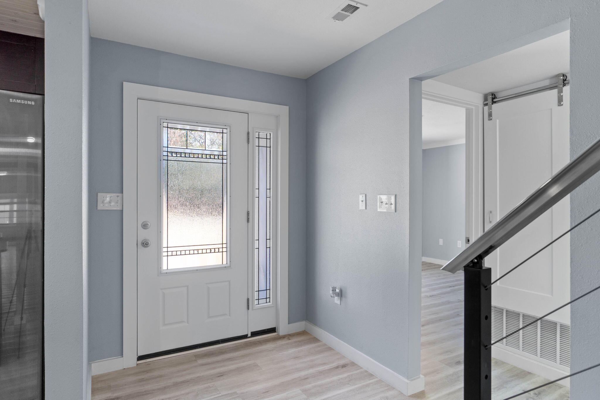 41 Solar Street Mary Esther, FL 32569 - Photo 5 of 40 a view of an entryway with wooden floor and door