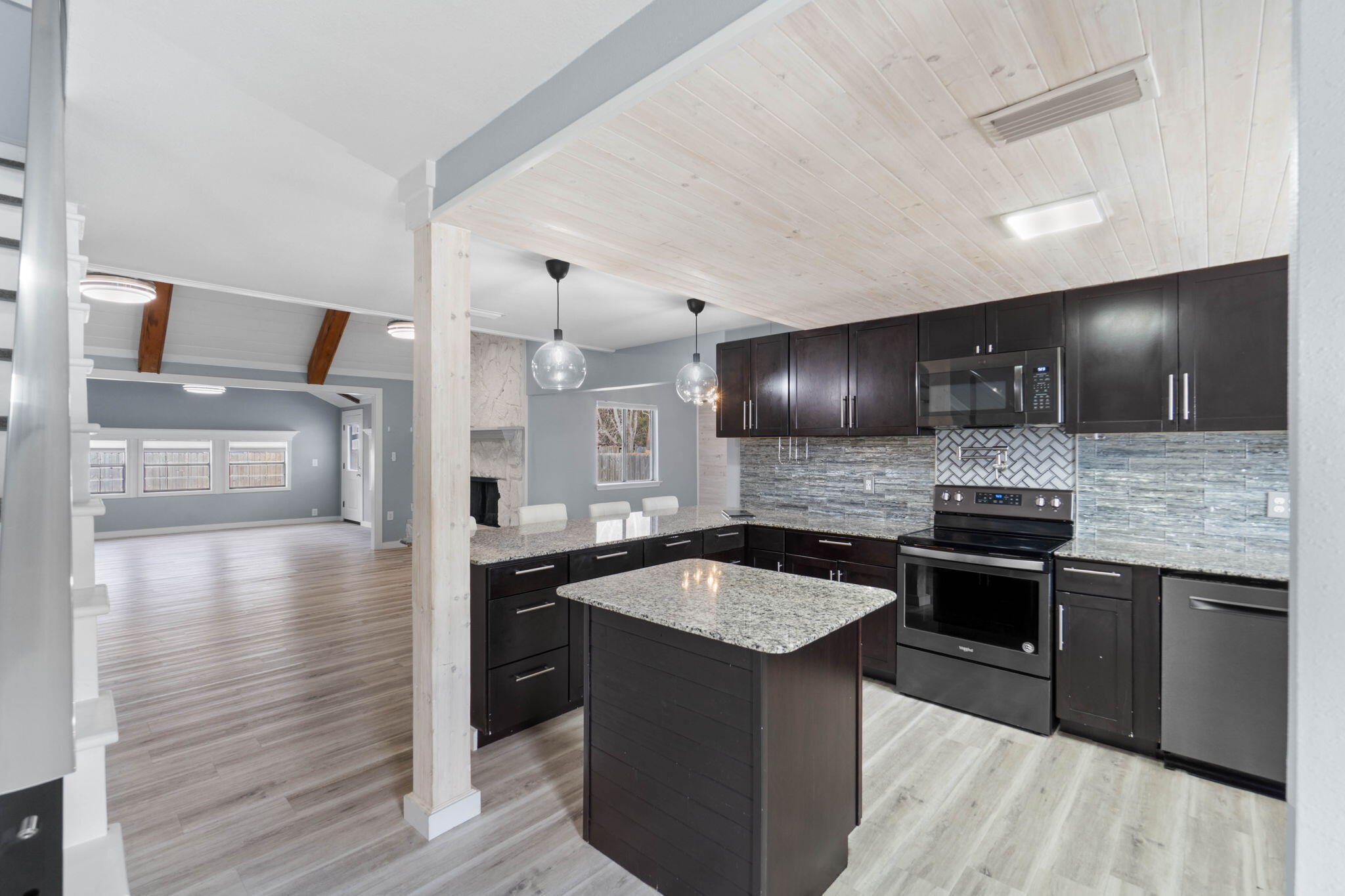 41 Solar Street Mary Esther, FL 32569 - Photo 7 of 40 a kitchen with stainless steel appliances granite countertop a sink and a stove