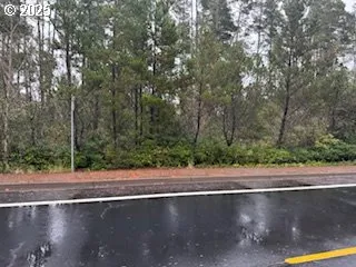 a view of a swimming pool with a yard