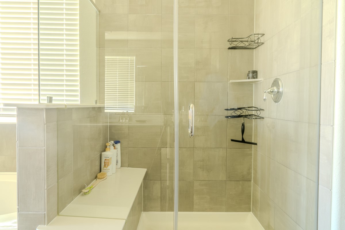 2617 Indigo Harvest Trail Pearland, TX 77089 - Photo 16 of 32 a bathroom with a shower