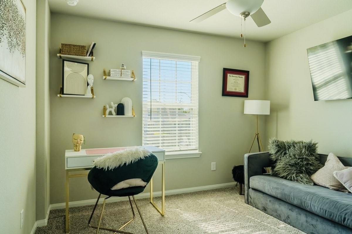 2617 Indigo Harvest Trail Pearland, TX 77089 - Photo 21 of 32 a living room with furniture and a window