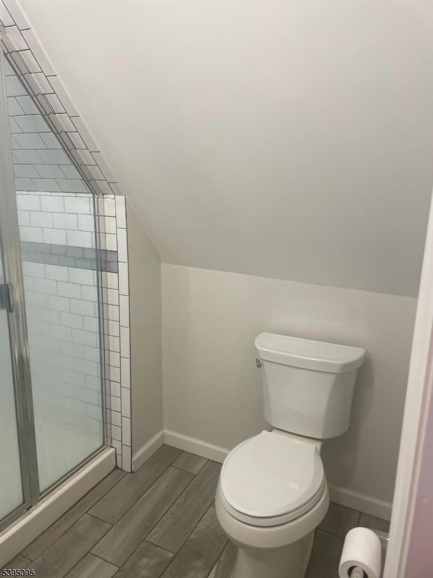 38 Morris Avenue, Unit 3 Springfield, NJ 07081 - Photo 5 of 12 a white toilet sitting next to a shower