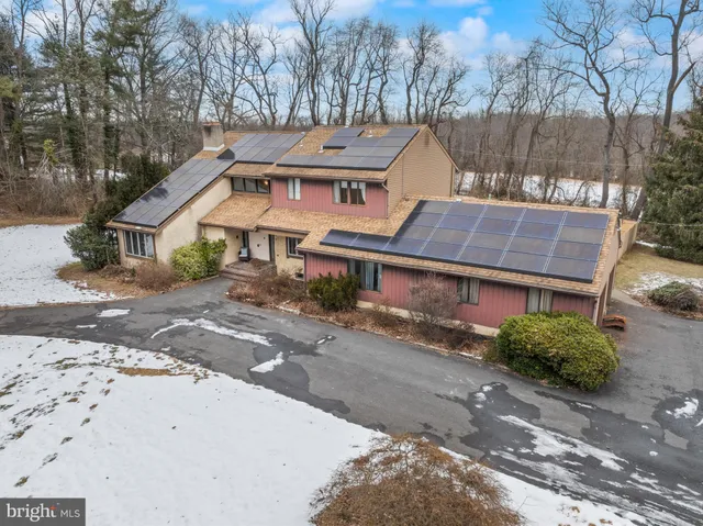 a view of a swimming pool and an outdoor space