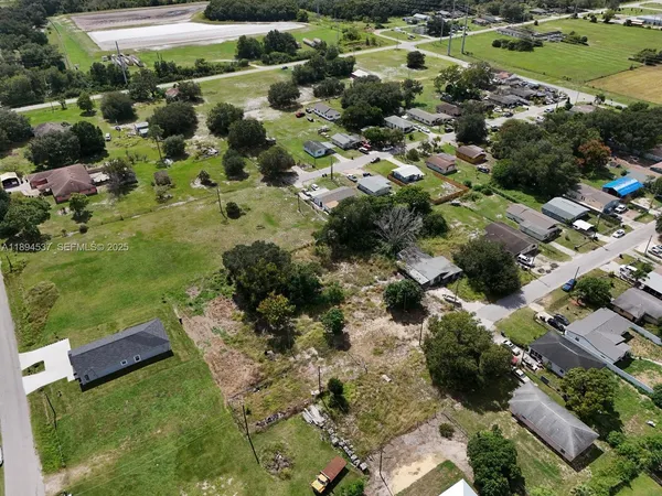 a view of a garden with a houses