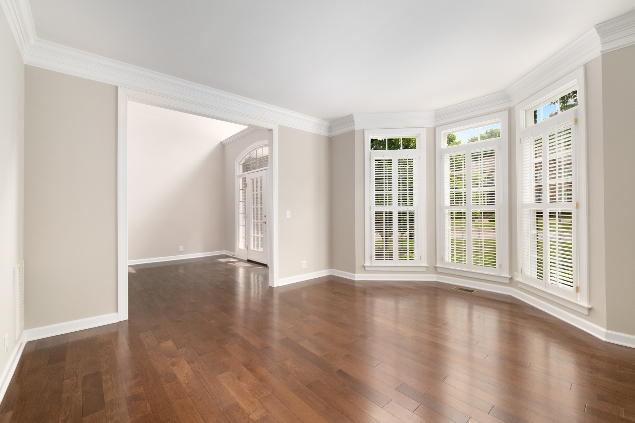 229 Gillette Drive Franklin, TN 37069 - Photo 11 of 47 a view of an empty room with wooden floor and a window