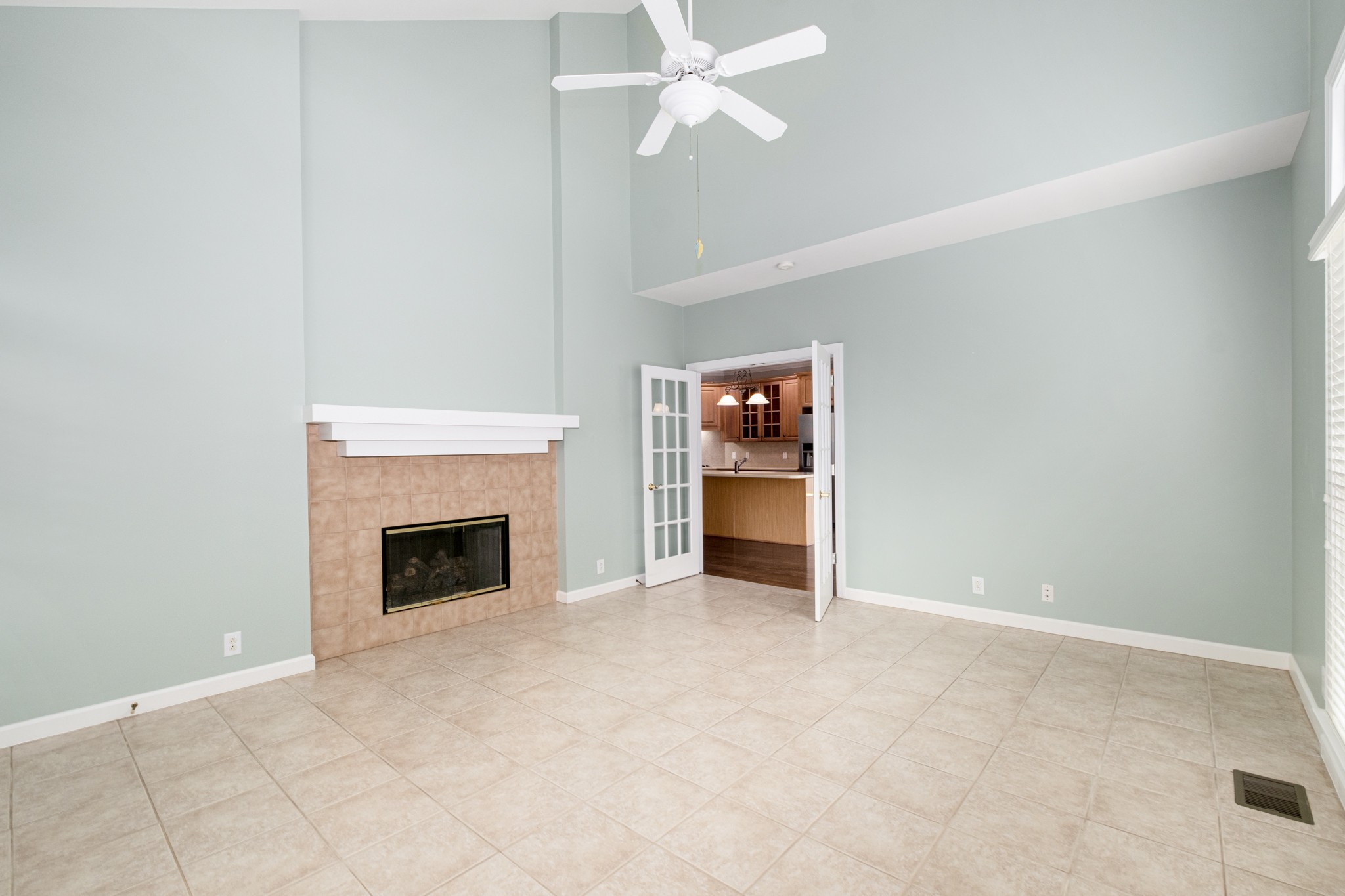 229 Gillette Drive Franklin, TN 37069 - Photo 16 of 47 an empty room with windows and fireplace