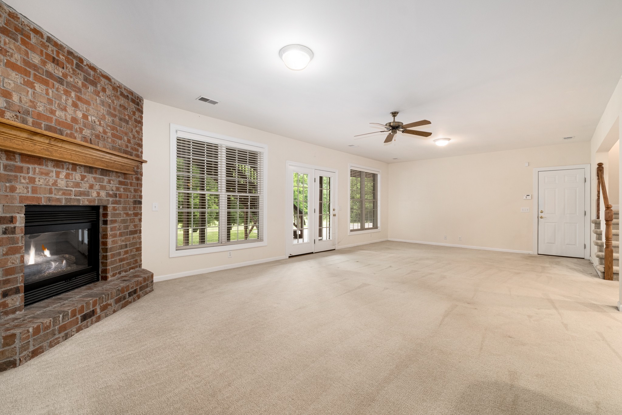 229 Gillette Drive Franklin, TN 37069 - Photo 20 of 47 a view of an empty room with a fireplace