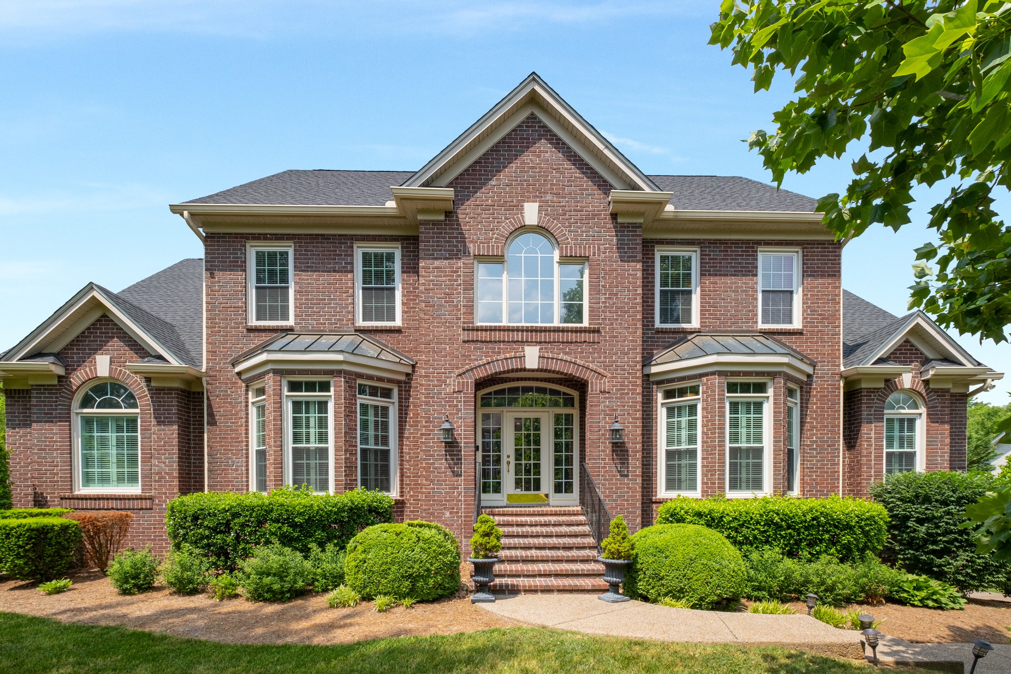 229 Gillette Drive Franklin, TN 37069 - Photo 2 of 47 a front view of a house with a yard