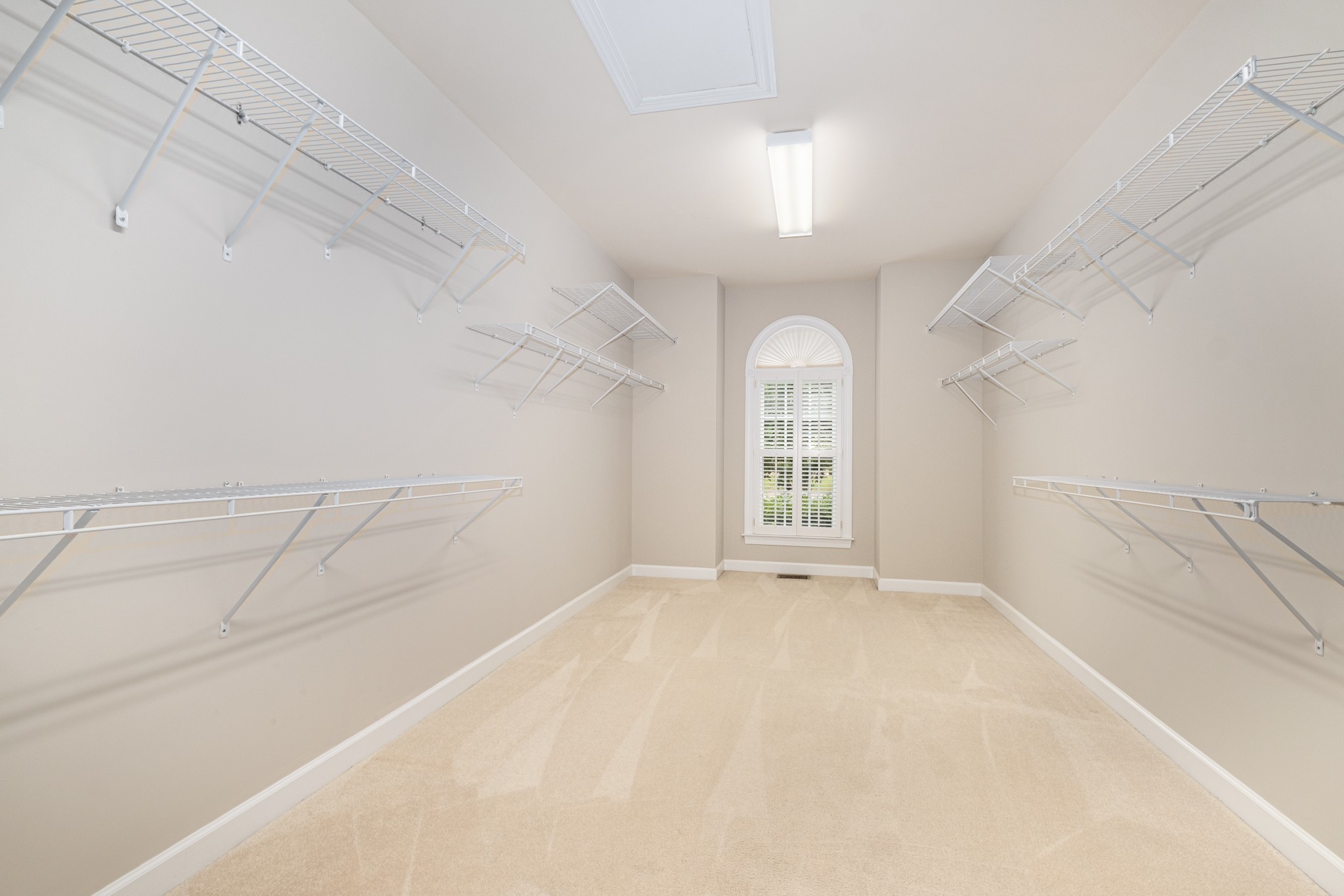 229 Gillette Drive Franklin, TN 37069 - Photo 29 of 47 en empty room with windows and chandelier fan