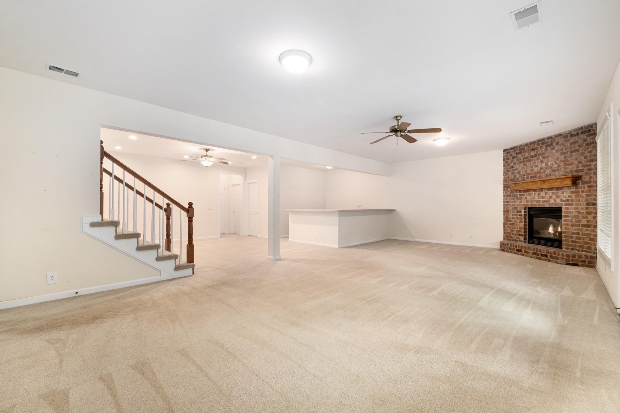 229 Gillette Drive Franklin, TN 37069 - Photo 33 of 47 a view of an empty room with a fireplace