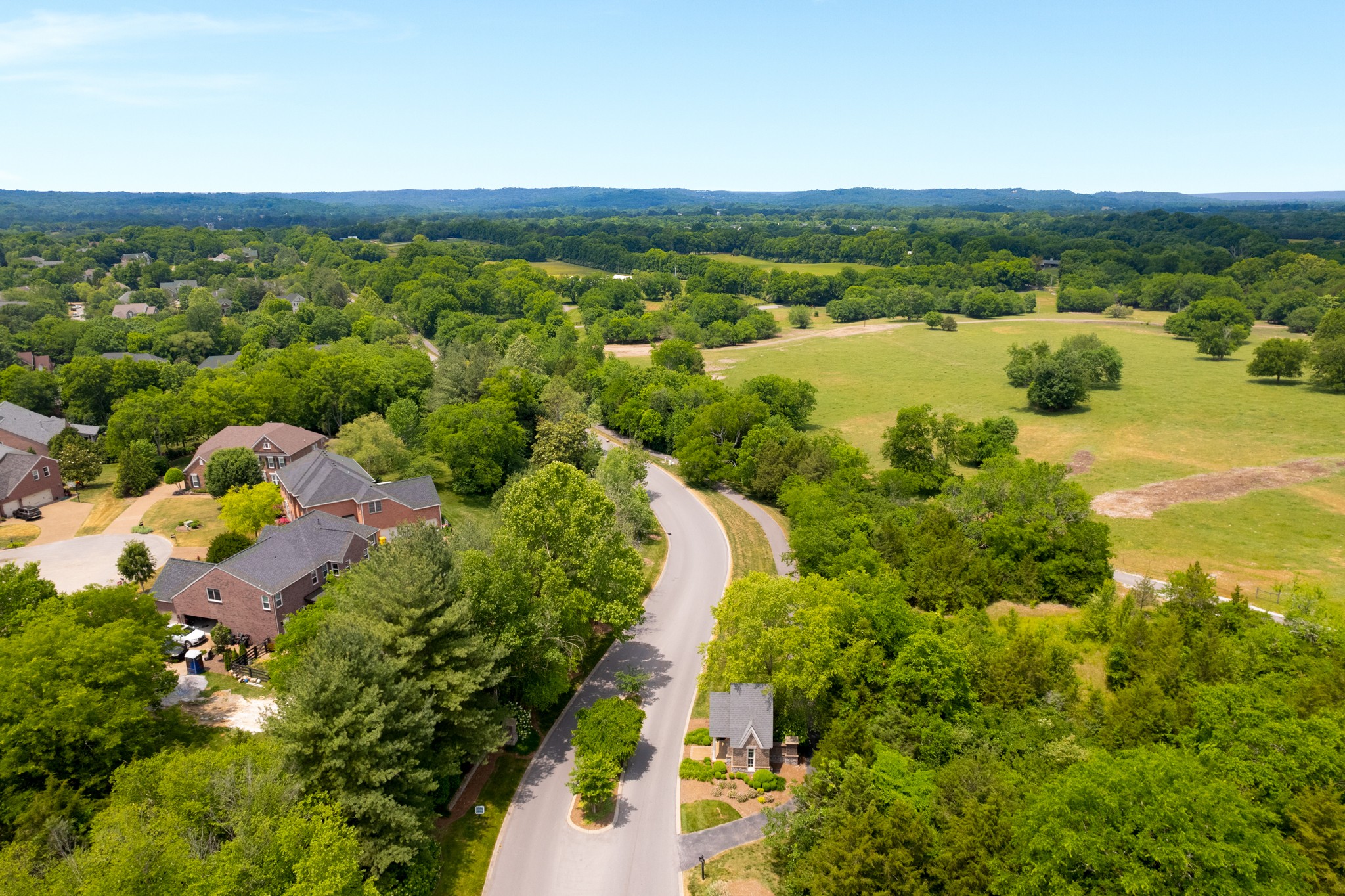 229 Gillette Drive Franklin, TN 37069 - Photo 47 of 47 a view of a lake with mountains in the background