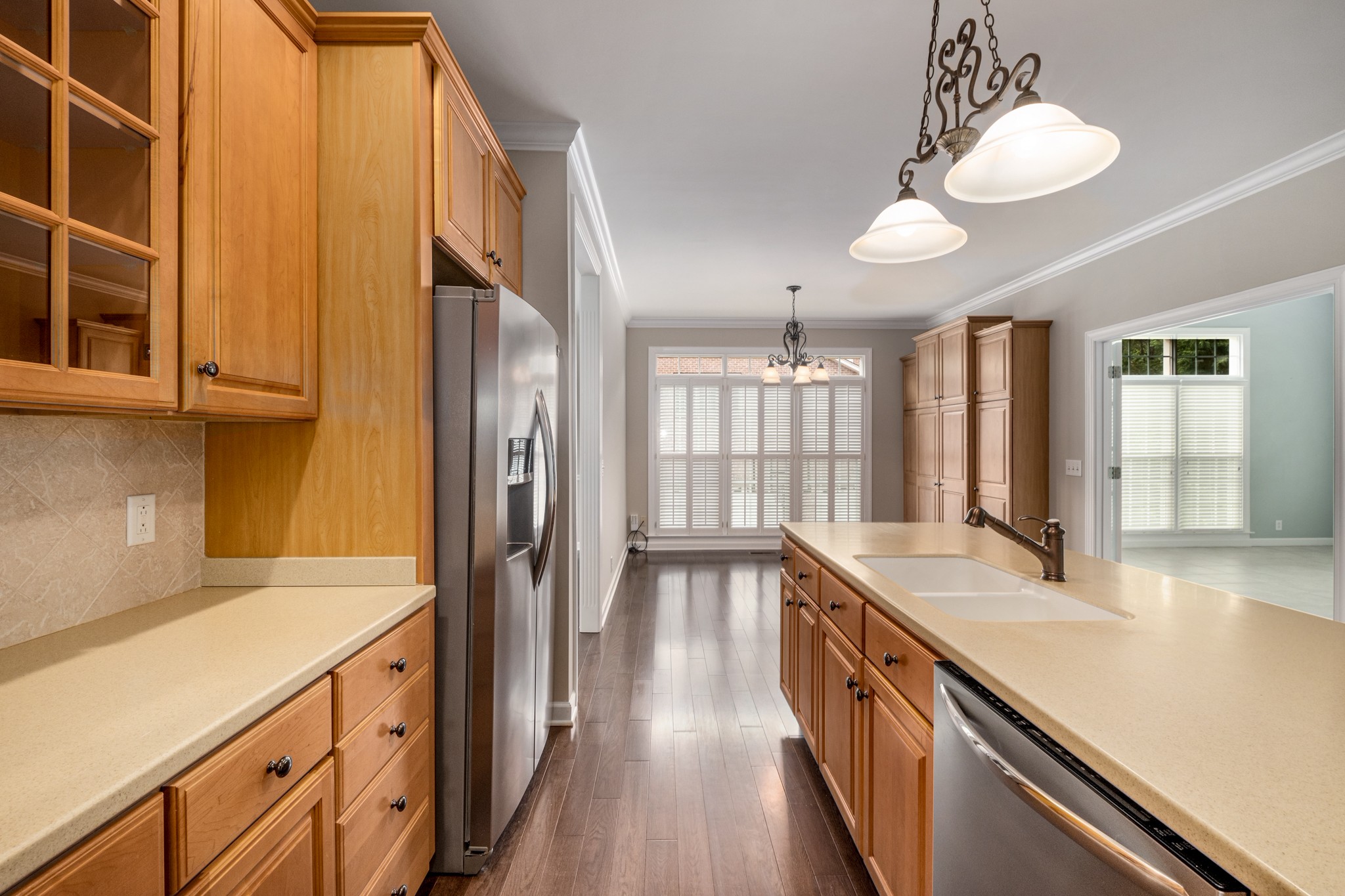 229 Gillette Drive Franklin, TN 37069 - Photo 7 of 47 a view of a kitchen with a sink and dishwasher wooden floor