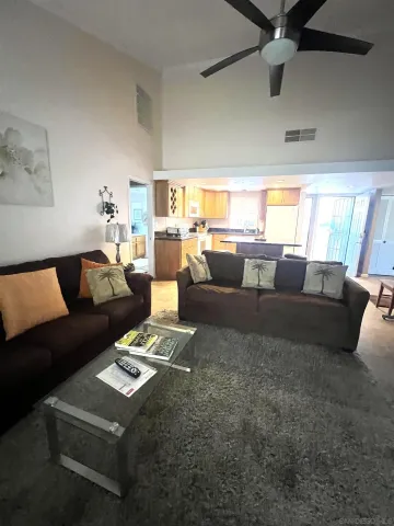 a living room with furniture and a couch