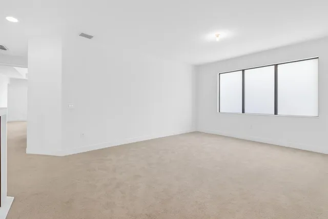 a view of a room with white paint