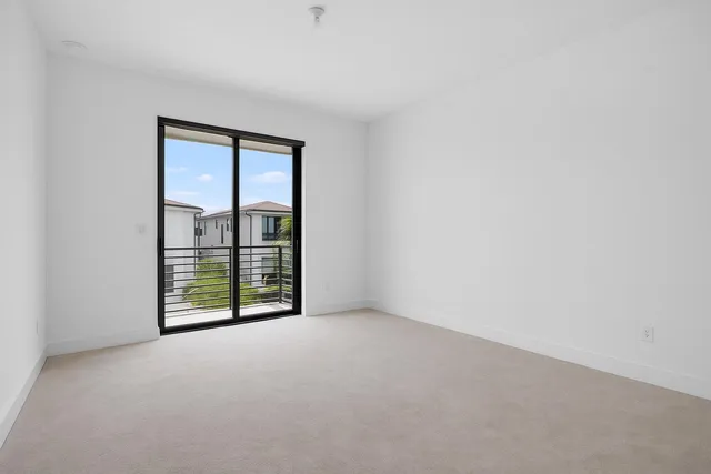 a bathroom with a toilet a sink and a shower