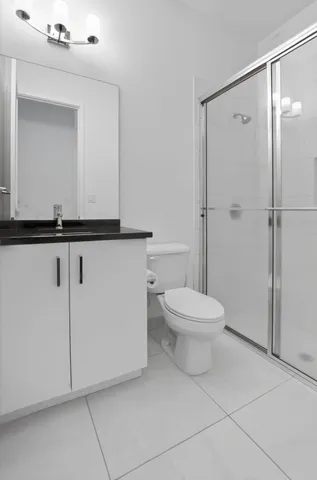 a aerial view of a house with a yard