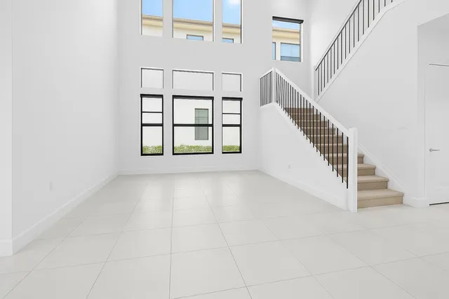 a view of entryway with stairs and a window