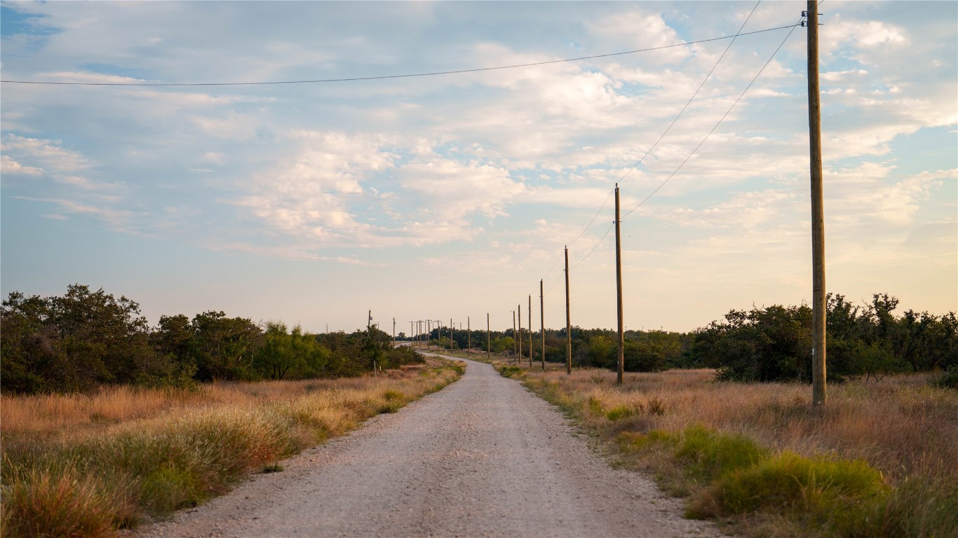 8500 Buck Ridge Drive Brady, TX 76825 - Photo 23 of 32 a view of a lake with a big yard