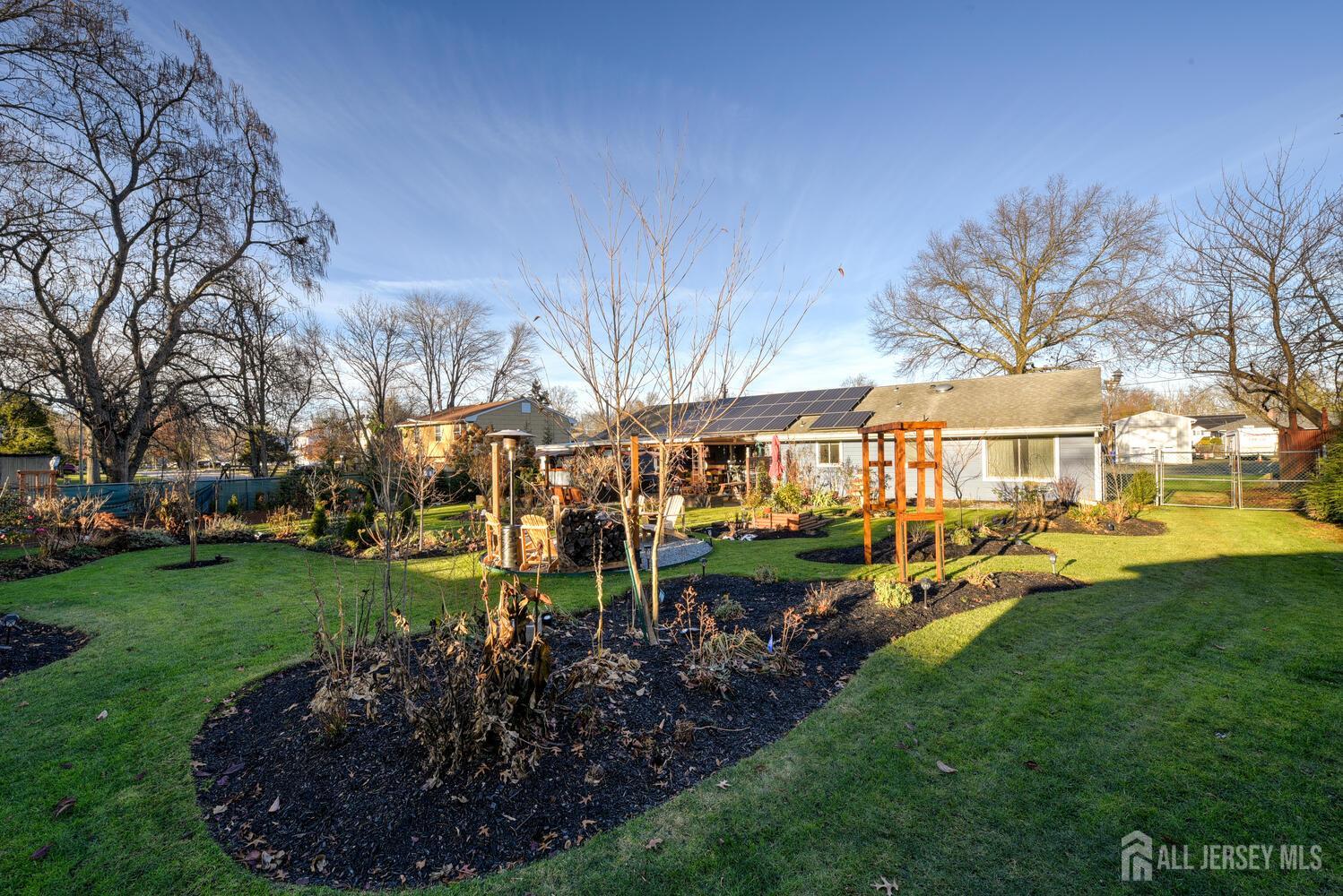 88 Stratton Street South Piscataway, NJ 08854 - Photo 24 of 28 a view of a yard with plants and large trees