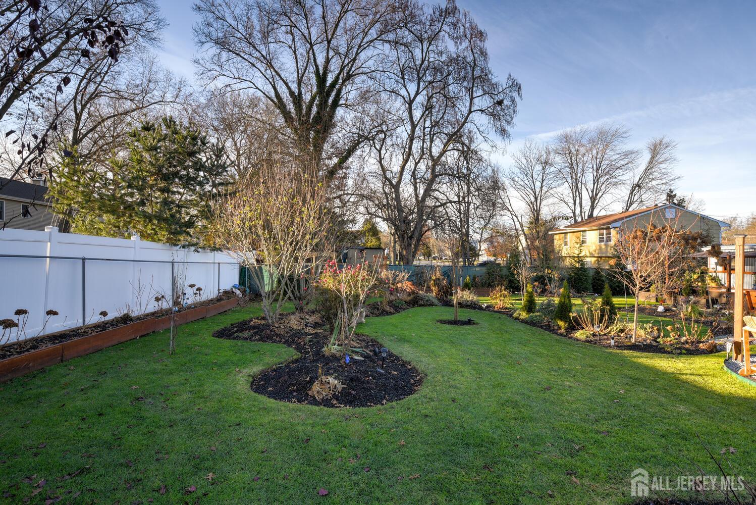 88 Stratton Street South Piscataway, NJ 08854 - Photo 25 of 28 a view of a garden with large trees