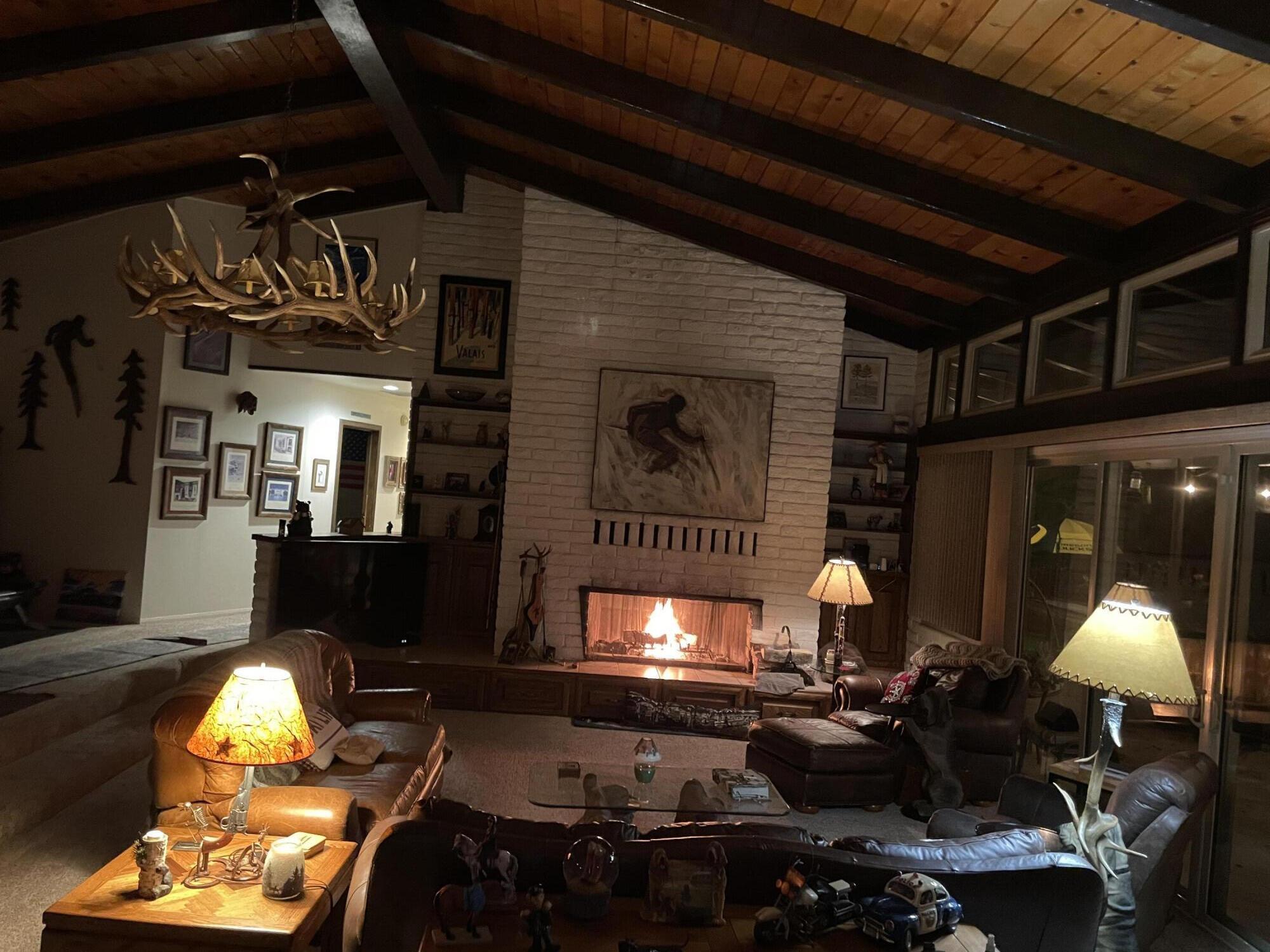 38540 Alva Drive Cherry Valley, CA 92223 - Photo 11 of 60 Living room with fire