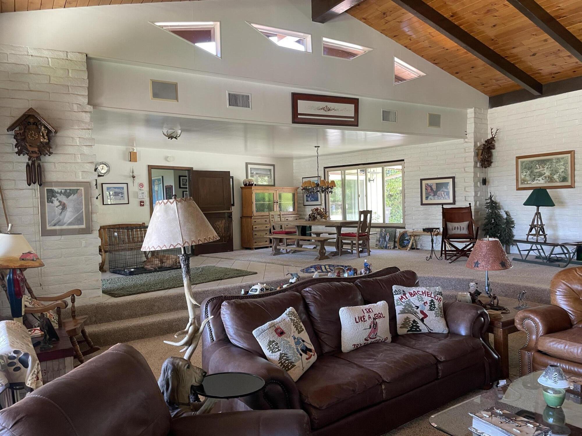 38540 Alva Drive Cherry Valley, CA 92223 - Photo 14 of 60 a living room with furniture and a wooden floor