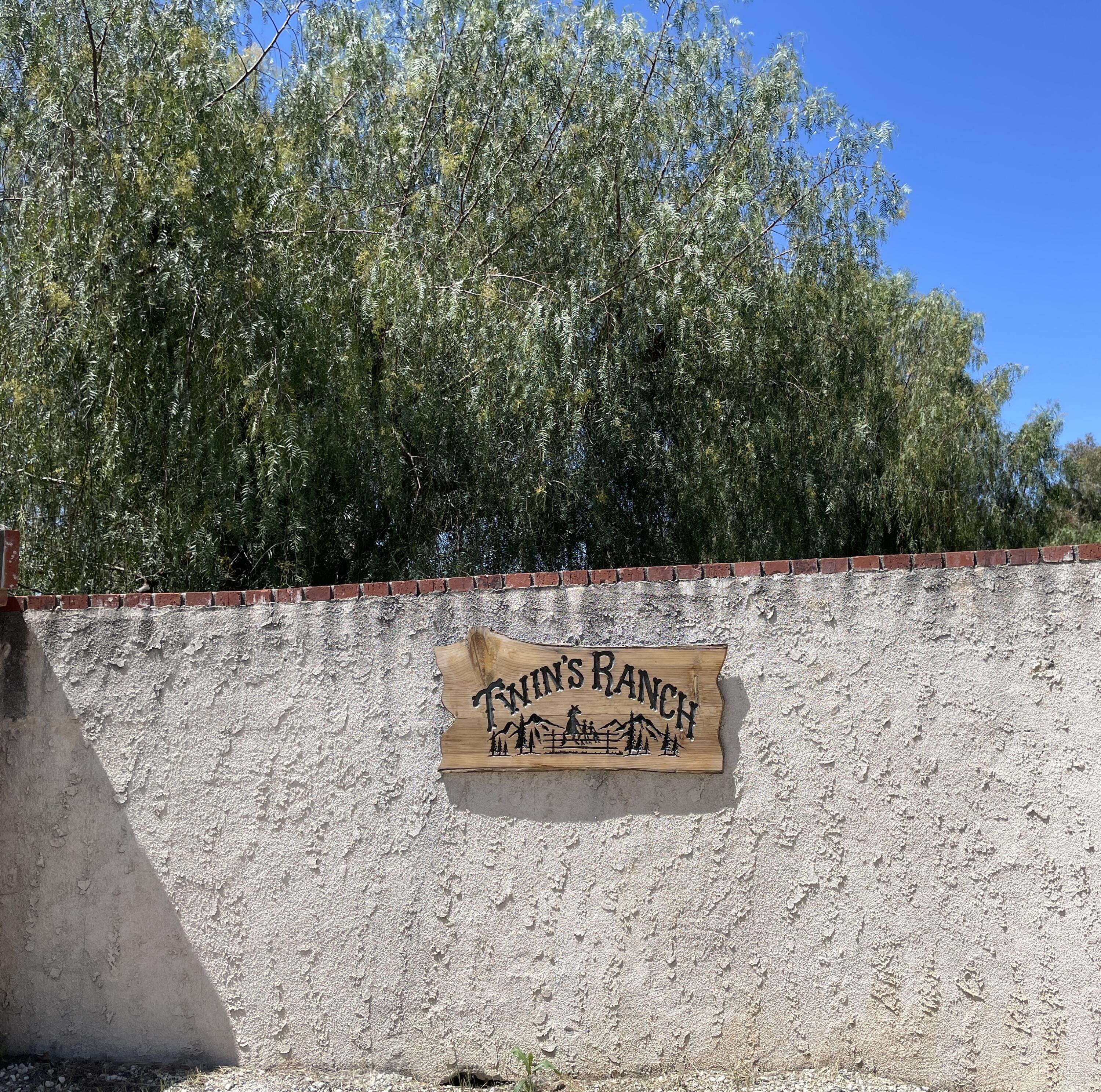38540 Alva Drive Cherry Valley, CA 92223 - Photo 2 of 60 a view of outdoor space with signage and flags