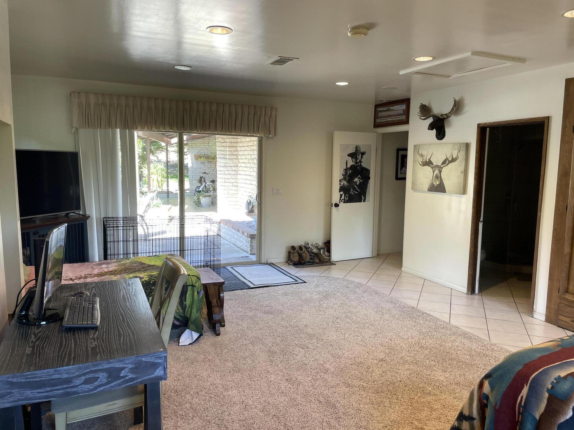 38540 Alva Drive Cherry Valley, CA 92223 - Photo 21 of 60 a bedroom with furniture and a window