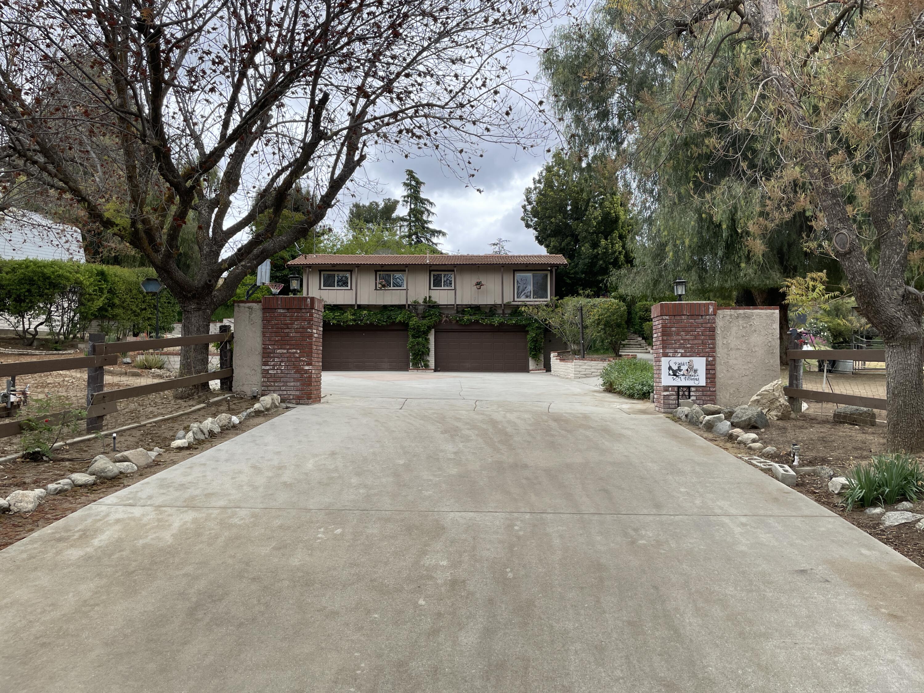 38540 Alva Drive Cherry Valley, CA 92223 - Photo 3 of 60 a view of a house with a yard and garage