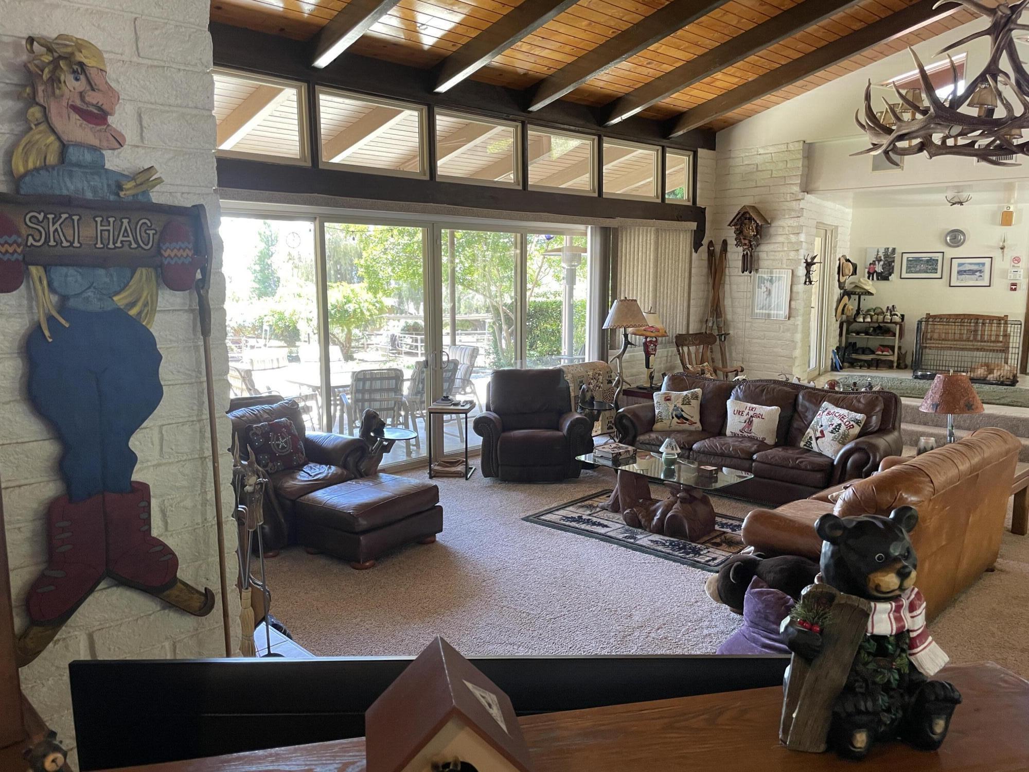 38540 Alva Drive Cherry Valley, CA 92223 - Photo 9 of 60 a living room with furniture and a large window