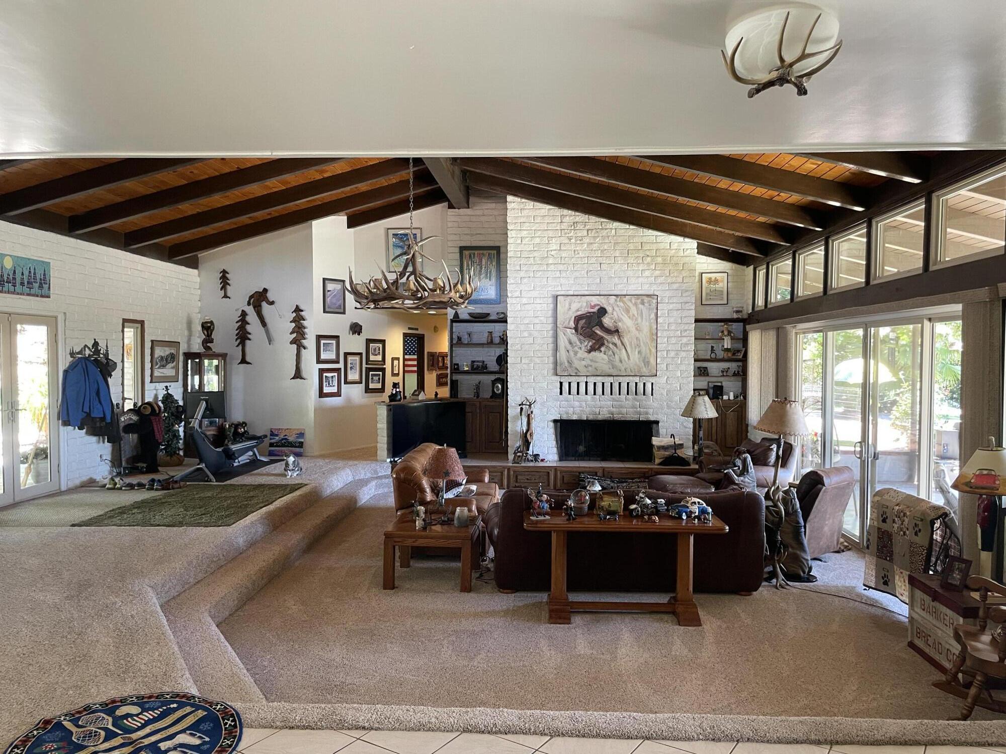 38540 Alva Drive Cherry Valley, CA 92223 - Photo 10 of 60 a area with furniture and a ceiling fan