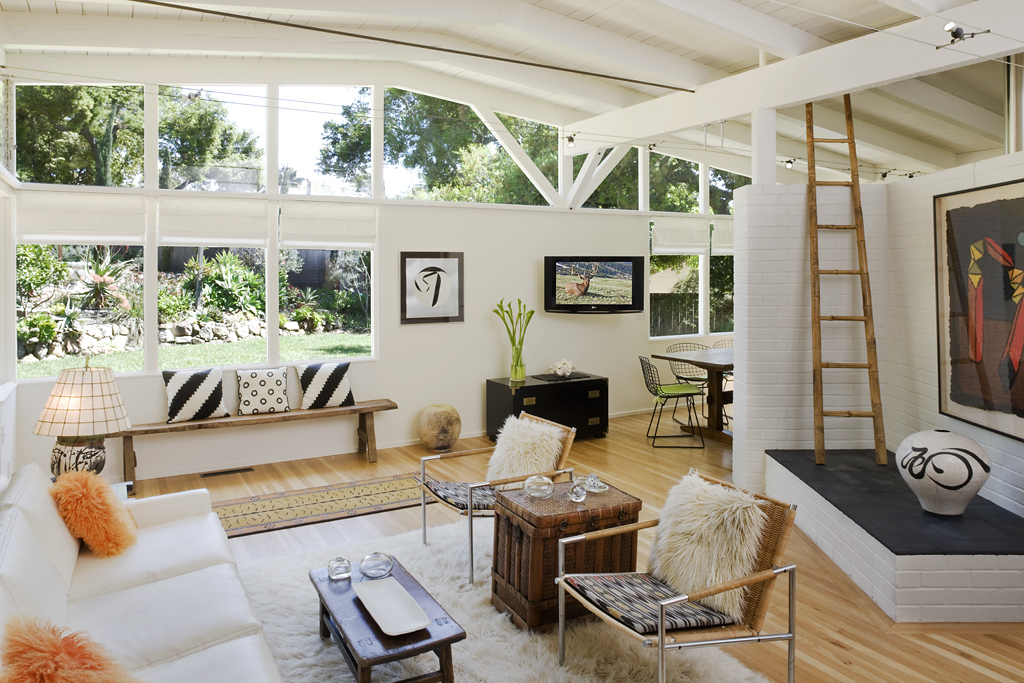 828 Tornoe Road Santa Barbara, CA 93105 - Photo 2 of 8 a living room with furniture and a floor to ceiling window
