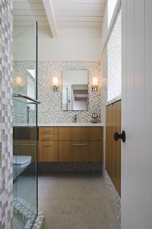 828 Tornoe Road Santa Barbara, CA 93105 - Photo 6 of 8 a bathroom with a granite countertop sink and a mirror
