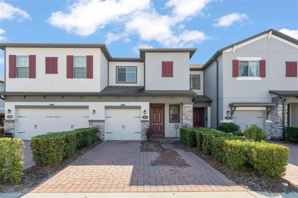 229 Rustic Loop Sanford, FL 32771 - Photo 1 of 38 a house view with a garden space