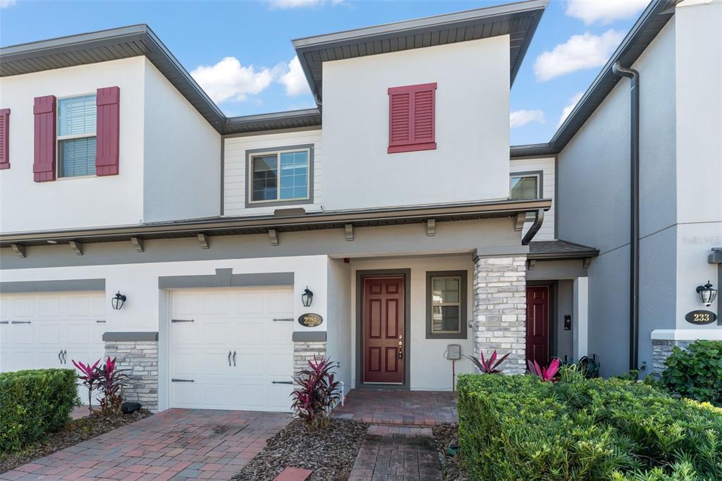 229 Rustic Loop Sanford, FL 32771 - Photo 2 of 38 a front view of house with an outdoor space