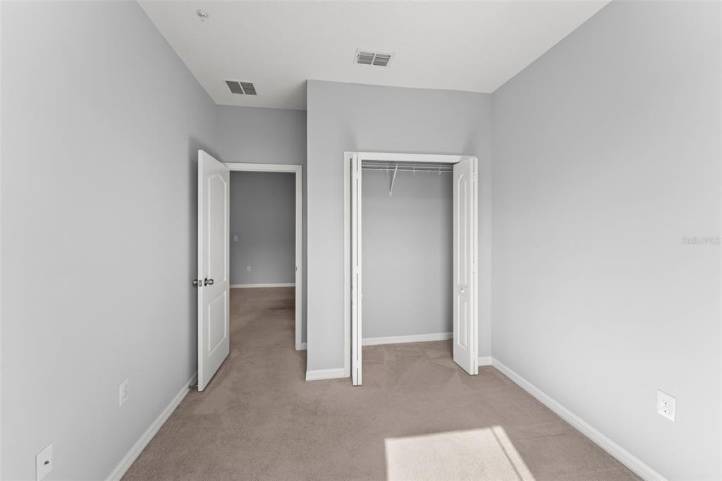 229 Rustic Loop Sanford, FL 32771 - Photo 24 of 38 a view of an empty room and closet